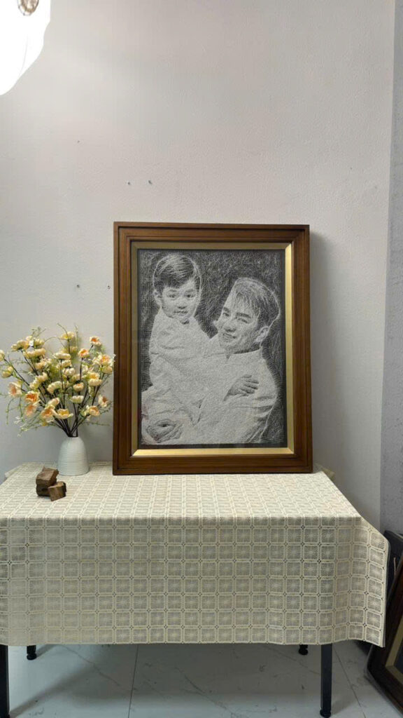 Tranh dây chân dung đinh chỉ